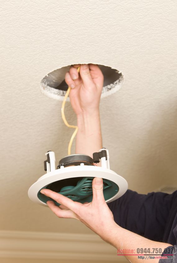 Man-installing-ceiling-speakers-IS.jpg